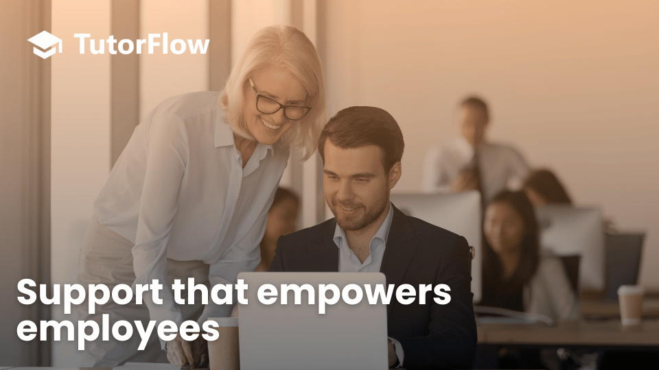 Mentor Guiding Employee in Office Setting